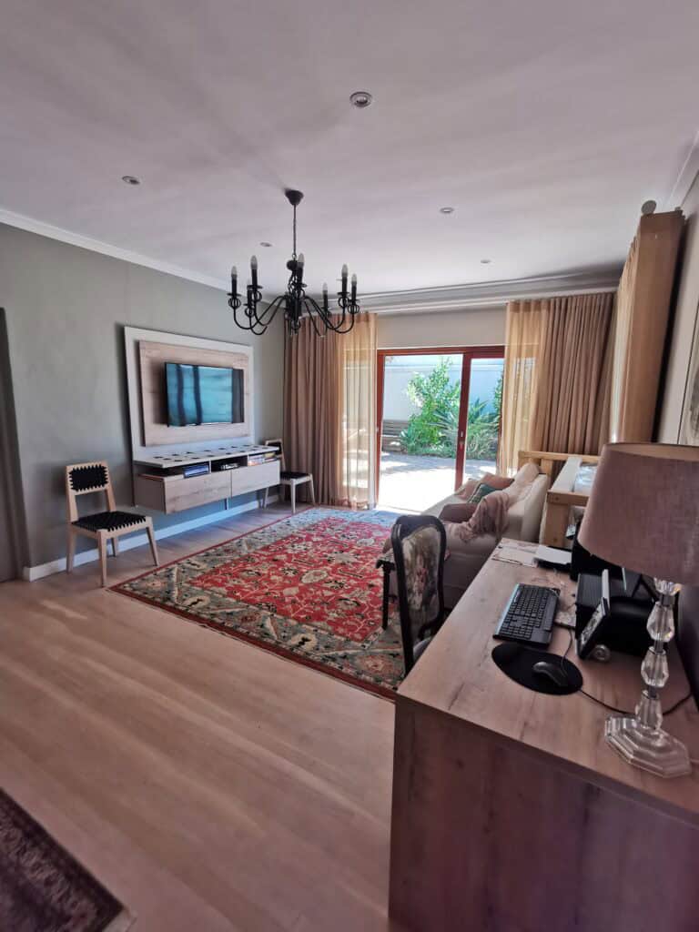 Living room interior with contemporary furniture and stylish decor elements.